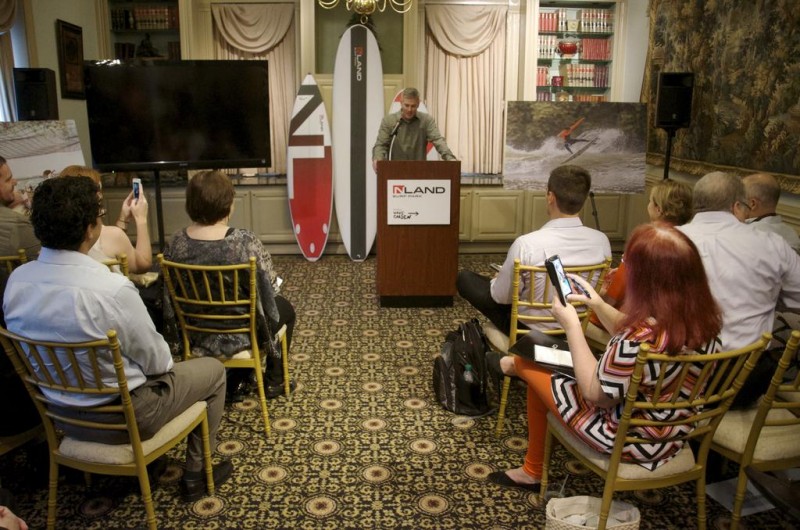 Doug Coors, the brewing heir behind the NLand Surf Park, speaks with members of the media Thursday during an official announcement of the massive surf park.