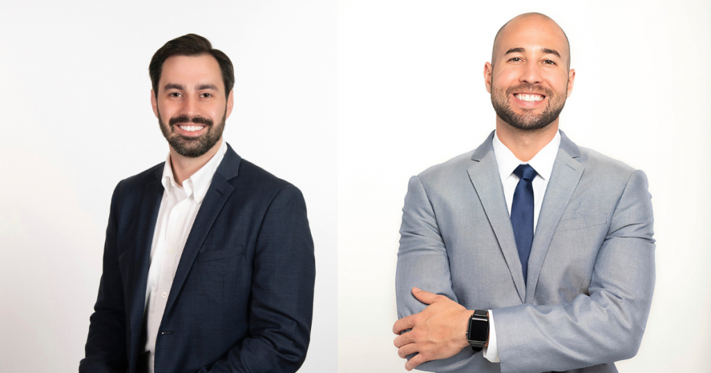 Image of two people who work with Kimley-Horn behind the Atlantic Park surf park