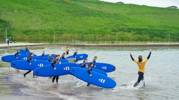 Kids surfing at Lost Shore Surf Resort