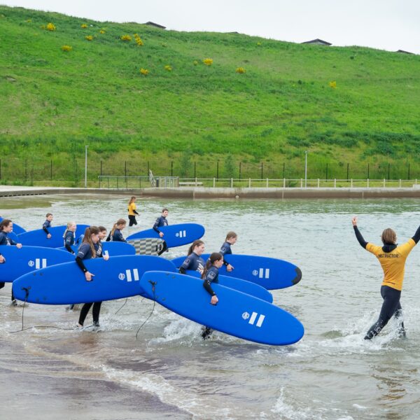 Kids surfing at Lost Shore Surf Resort