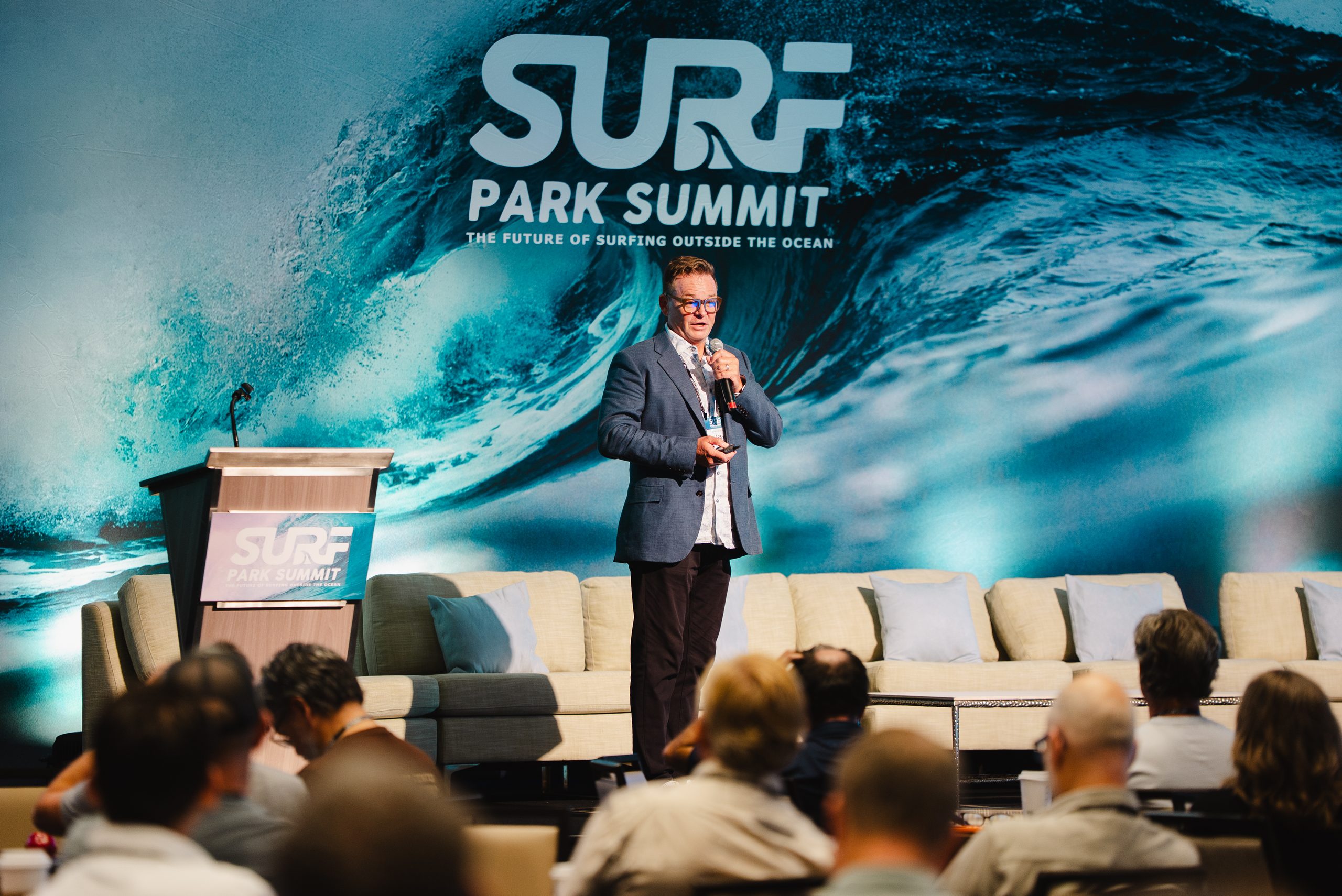 Jess Ponting of Surf Park Central on stage