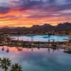 Rendering of Hidden Lake Surf Resort with a sunset over the nearby mountains